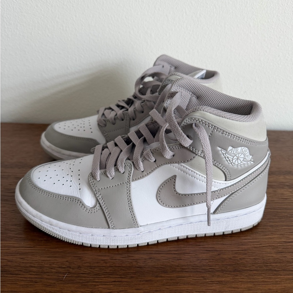 Nike Air Jordan 1 Mid in a white/light-gray colorway.